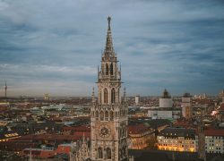 A stunning view of Munich's New Town Hall at dusk showcasing its Gothic architecture.