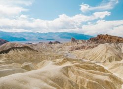 Stunning arid landscape of Death Valley with rugged hills and vast desert views.